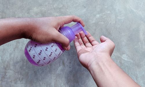 Close-up of hand holding hands