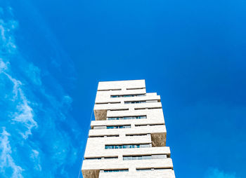 Low angle view of building against blue sky