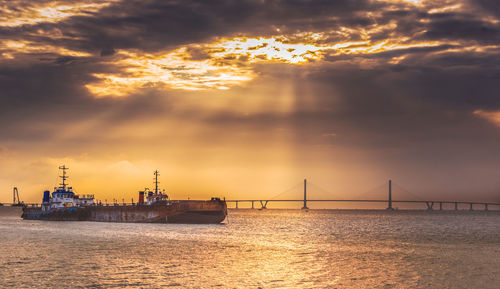 Scenic view of sea against sky during sunset