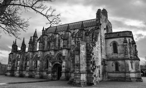 Low angle view of scottish chapel in black and white