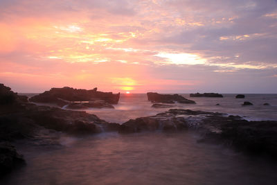 Scenic view of sea against sky during sunset