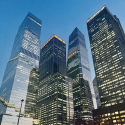 Low angle view of modern buildings against sky