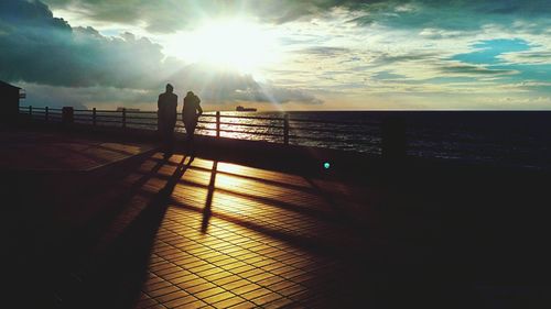 Scenic view of sea at sunset