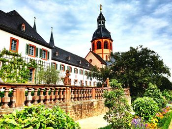 Christian benedictine basilica against cloudy sky