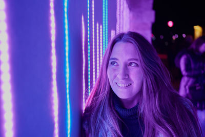 Portrait of smiling young woman