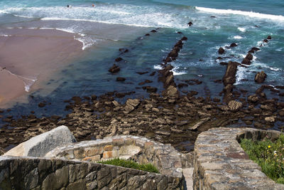 High angle view of rocks on shore