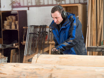 Carpenter working on wood