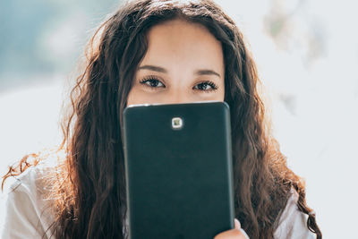 Young woman using mobile phone