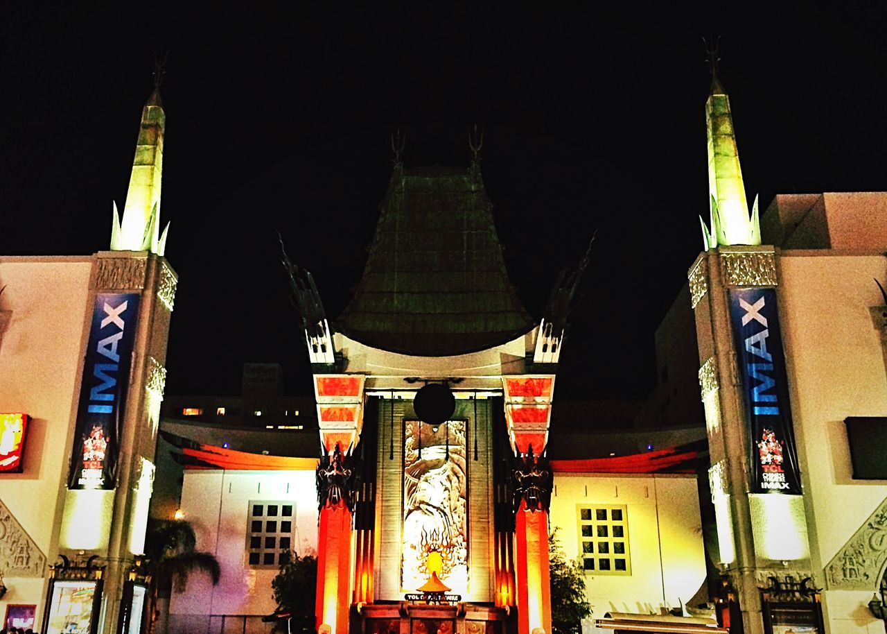 architecture, building exterior, built structure, religion, place of worship, spirituality, low angle view, church, night, city, cathedral, famous place, travel destinations, illuminated, temple - building, history, clear sky, outdoors