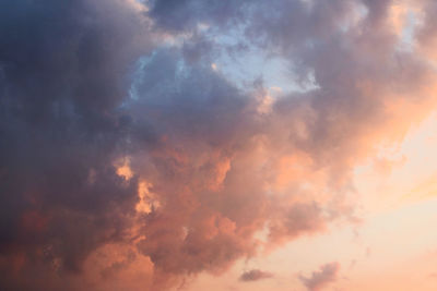 Low angle view of dramatic sky during sunset