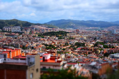 Aerial view of townscape against sky