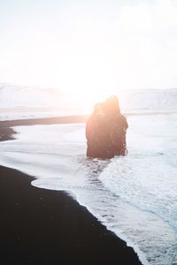 Scenic view of sea against clear sky during sunset