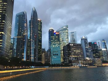 View of skyscrapers lit up at night