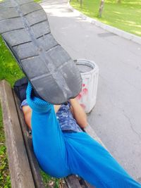 High angle view of girl wearing shoes