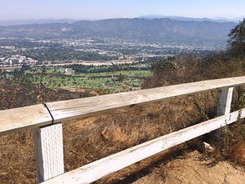 High angle view of road by landscape against sky