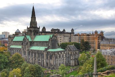 Exterior of buildings against sky in city