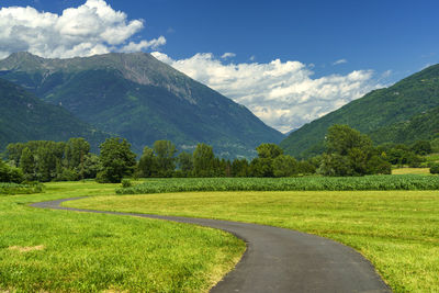 Scenic view of landscape and mountains against sky
