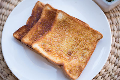 High angle view of bread in plate on table