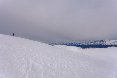 Scenic view of snow covered mountain against sky