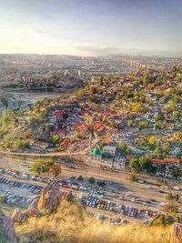 Aerial view of cityscape against sky