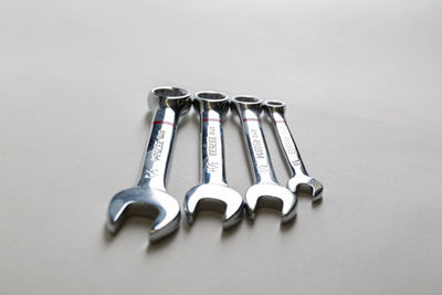 High angle view of objects on table against white background