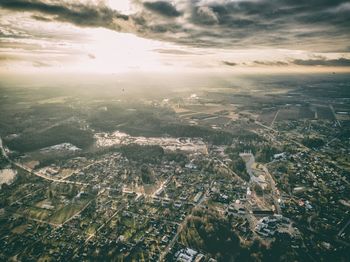 Aerial view of cityscape against sky