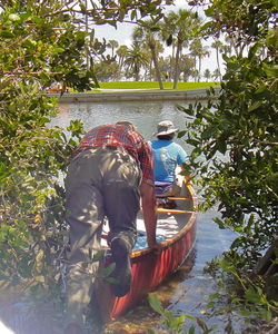 Full length of woman standing in water