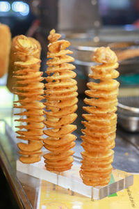 Spiral fried sweet potato in ho thi ky street, ho chi minh city