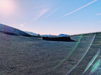 Scenic view of land against sky