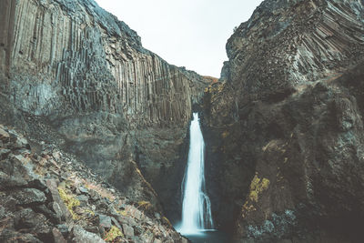 Low angle view of waterfall