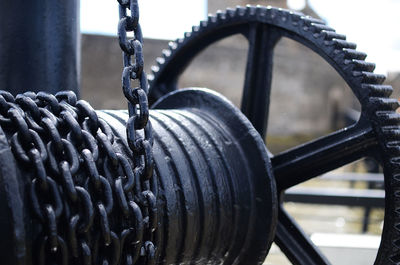 Close-up of tire on chain