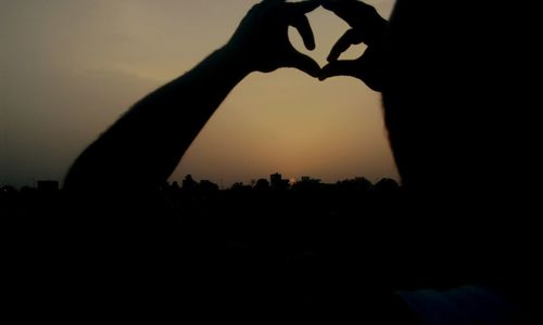 Silhouette people at sunset