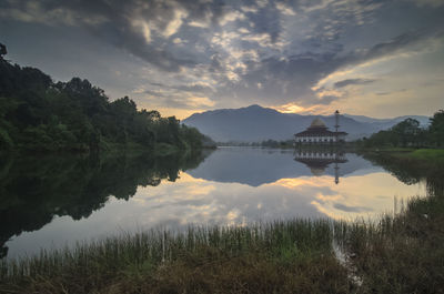 Reflection of trees in calm lake