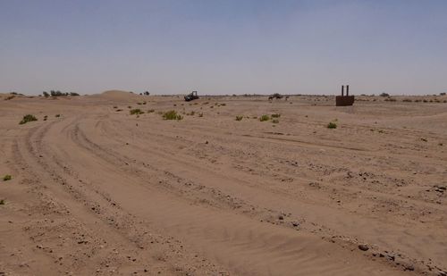 Scenic view of desert against clear sky