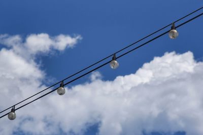 Low angle view of street light against sky