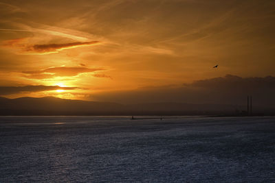 Scenic view of sunset over sea