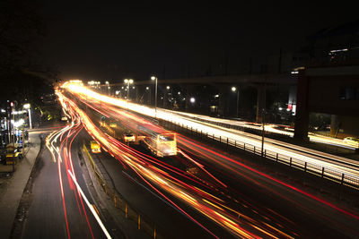 Light trails on city street at night