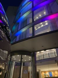 Low angle view of illuminated building at night