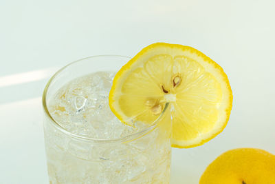 Close-up of drink against white background