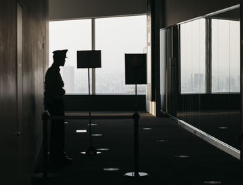 Man standing in corridor