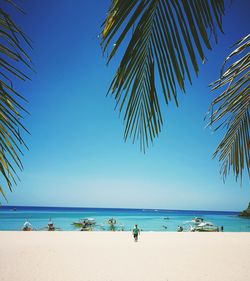 Scenic view of beach against clear sky