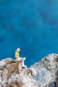 Close-up of stuffed toy on rock