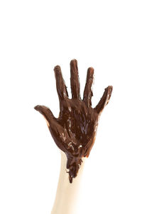 Close-up of chocolate against white background