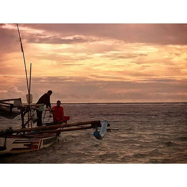 sea, water, horizon over water, sky, sunset, nautical vessel, boat, scenics, tranquility, tranquil scene, beauty in nature, cloud - sky, transportation, nature, mode of transport, idyllic, orange color, cloud, moored, auto post production filter