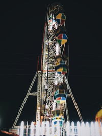 Low angle view of illuminated built structure