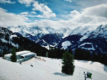 Scenic view of snowcapped mountains against sky