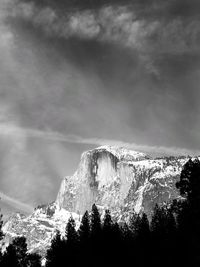 Scenic view of mountains against sky during winter