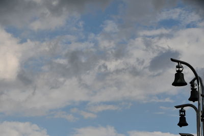 Low angle view of street light against sky