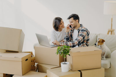 Couple sitting on sofa