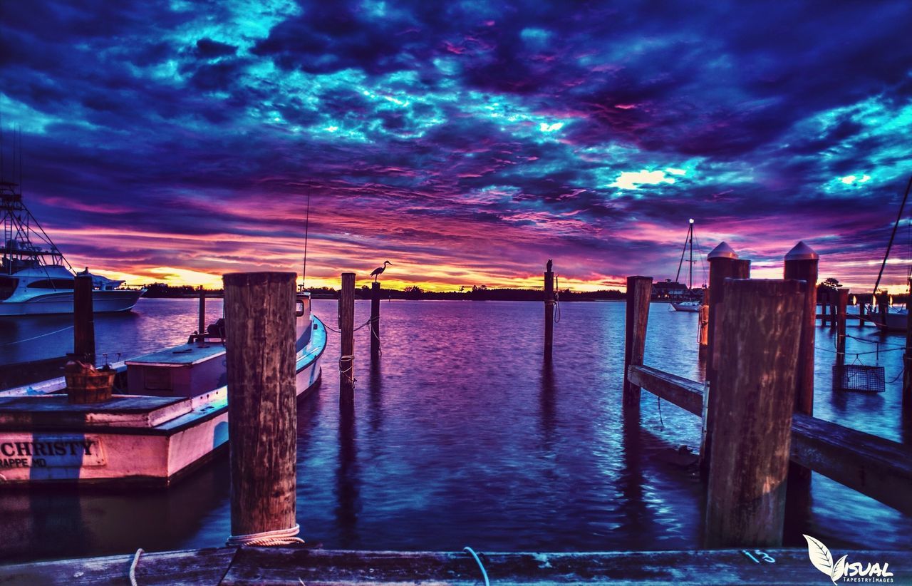 sky, cloud - sky, cloudy, water, sunset, cloud, built structure, sea, dramatic sky, weather, scenics, architecture, beauty in nature, tranquility, dusk, nature, tranquil scene, building exterior, storm cloud, pier